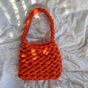 Hand-made orange crochet bag with plush yarn
